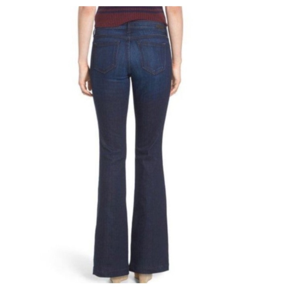 STS Blue Flare Jeans. Size 27 X 32” in length.